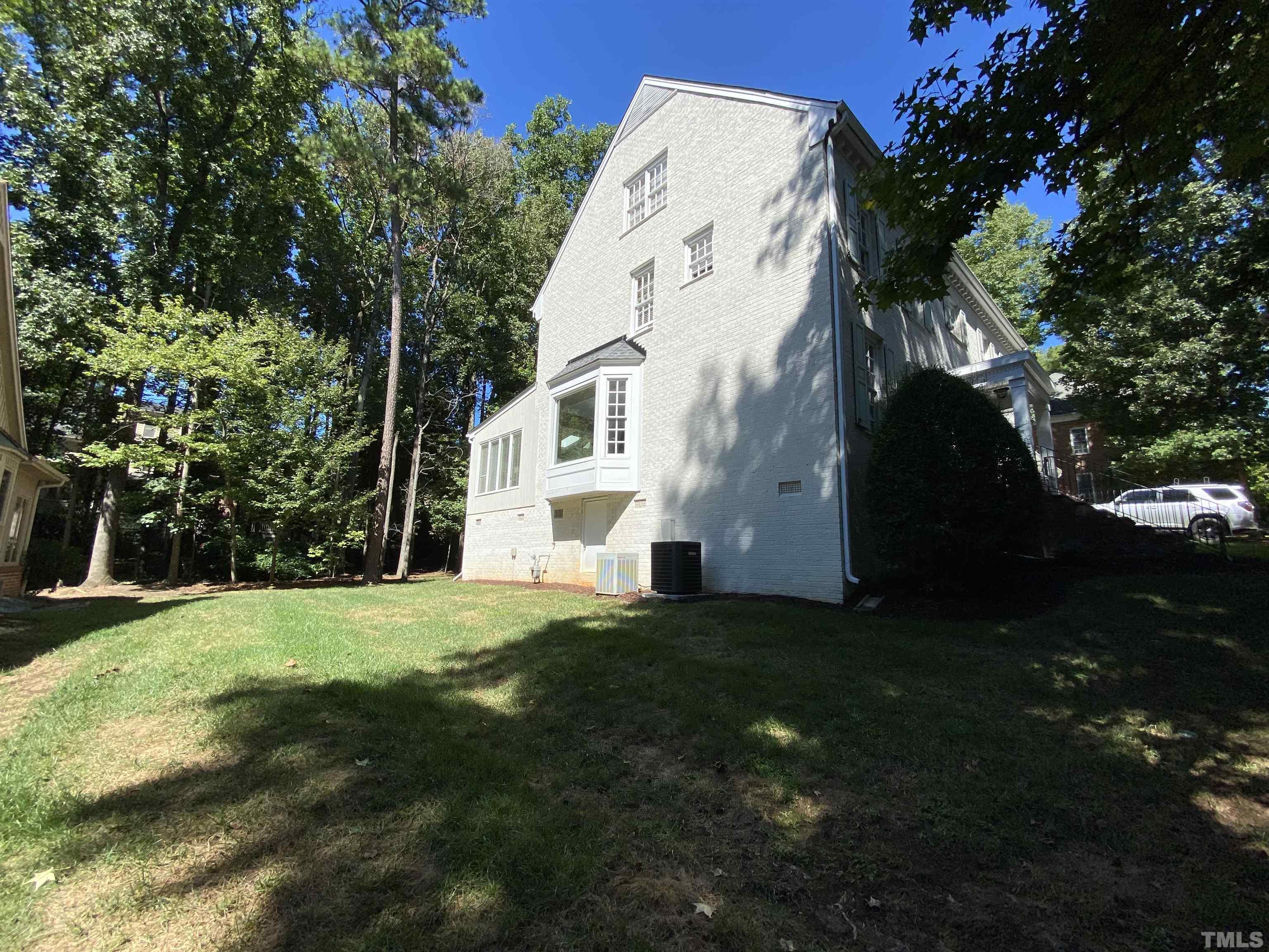 7313 Rainwater Road Raleigh, NC 27615 - Photo 3 of 30 a view of white house with a yard