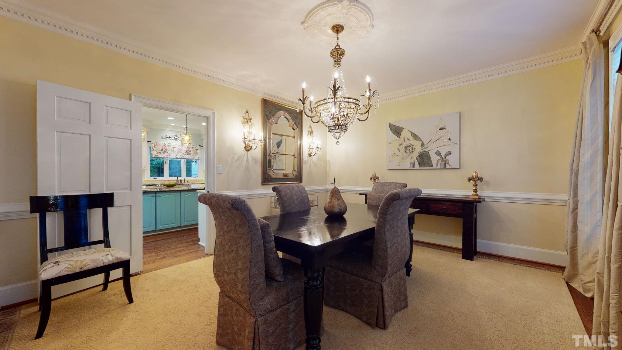 7313 Rainwater Road Raleigh, NC 27615 - Photo 8 of 30 a dining room with furniture and window