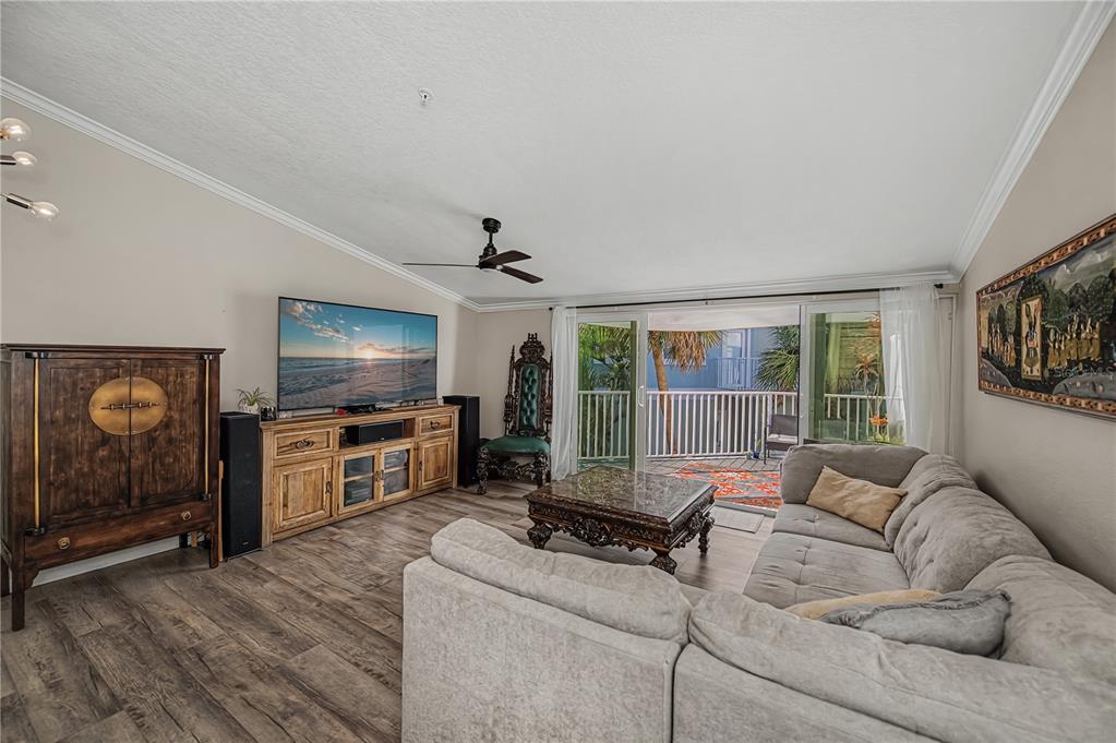 2255 North Beach Road, Unit 20 Englewood, FL 34223 - Photo 11 of 50 a living room with furniture and a flat screen tv