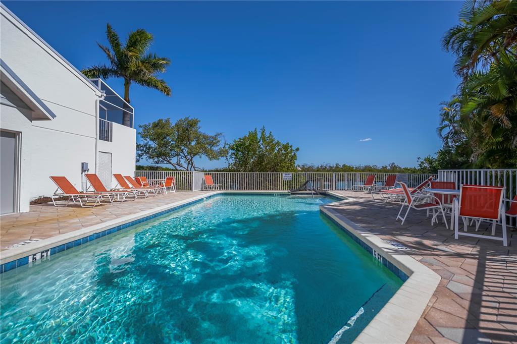 2255 North Beach Road, Unit 20 Englewood, FL 34223 - Photo 16 of 50 a view of a backyard with a patio
