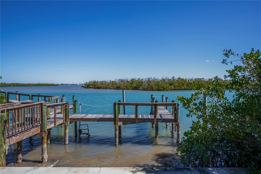 2255 North Beach Road, Unit 20 Englewood, FL 34223 - Photo 35 of 50 a view of a terrace with sitting area