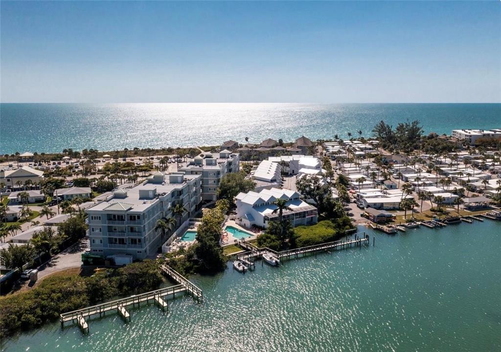 2255 North Beach Road, Unit 20 Englewood, FL 34223 - Photo 4 of 50 an aerial view of a house with a garden