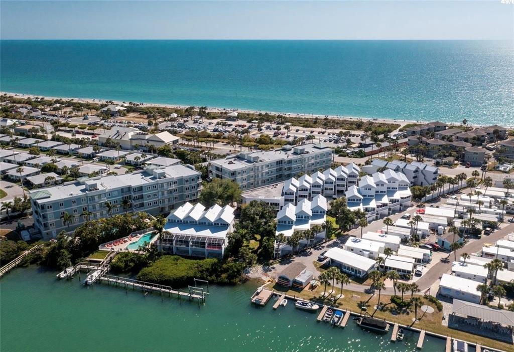 2255 North Beach Road, Unit 20 Englewood, FL 34223 - Photo 6 of 50 an aerial view of a ocean with beach