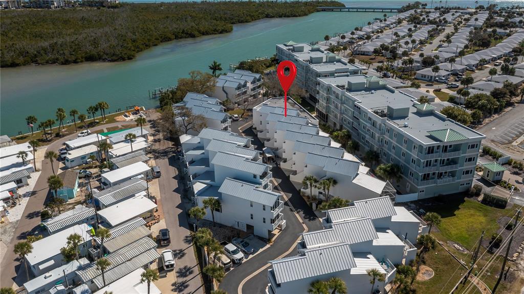 2255 North Beach Road, Unit 20 Englewood, FL 34223 - Photo 8 of 50 an aerial view of a houses with outdoor space