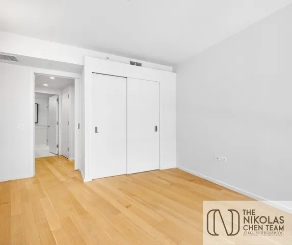 a view of a room with a large window