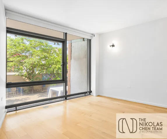 a bathroom with a sink a toilet and a shower