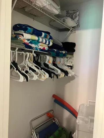 a bathroom with a sink mirror vanity and toilet