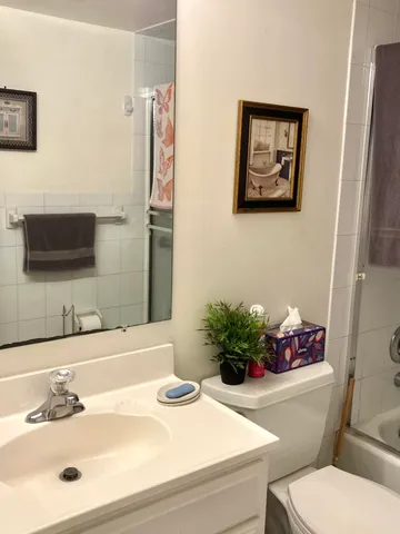 a living room with furniture fireplace and a flat screen tv