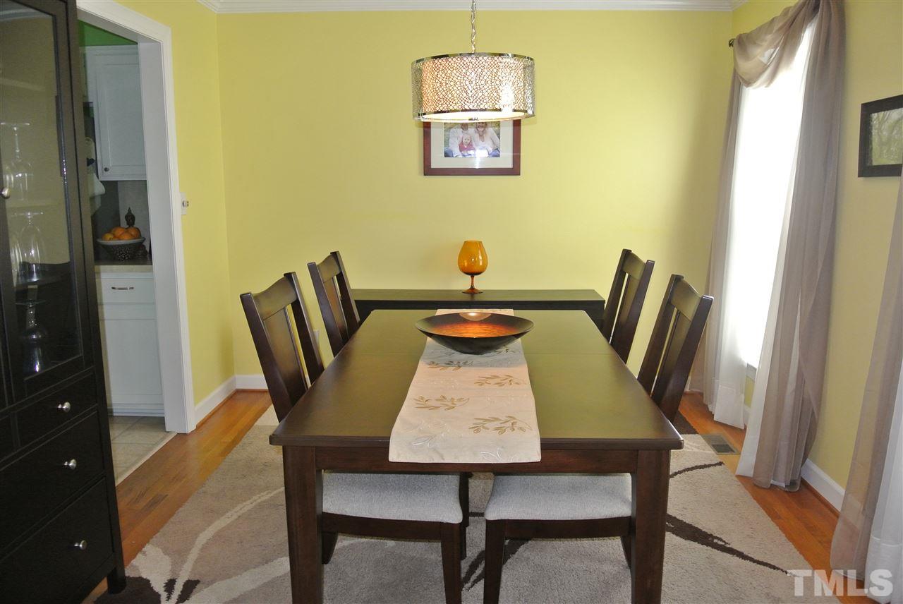 3108 Ridgestone Parkway Durham, NC 27712 - Photo 2 of 14 Formal dining room with hardwood floors & plenty of light.