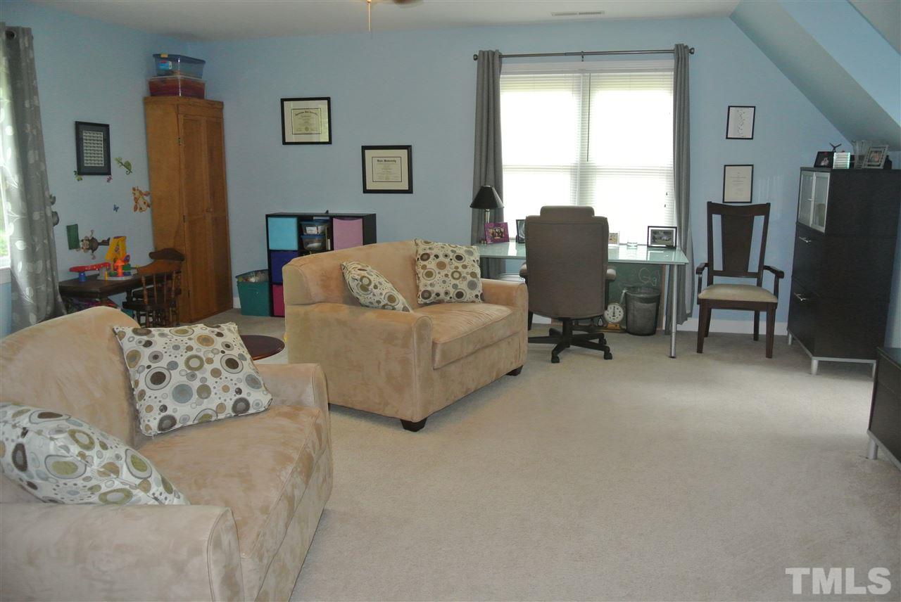 3108 Ridgestone Parkway Durham, NC 27712 - Photo 11 of 14 18 X 18 bonus room with 2 closets & extra storage in built-in dormer window seat.