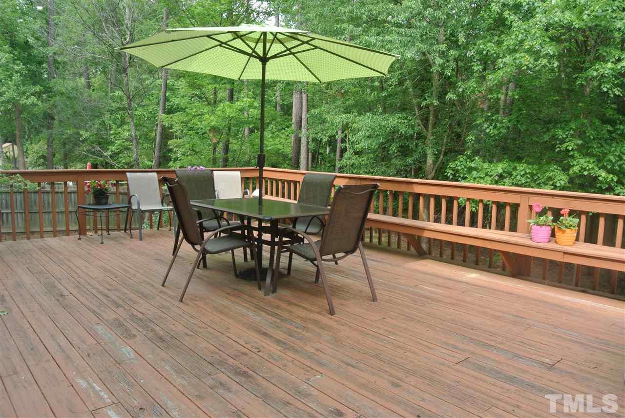 3108 Ridgestone Parkway Durham, NC 27712 - Photo 12 of 14 Oversized deck looks out onto fenced .36 acre level lot.