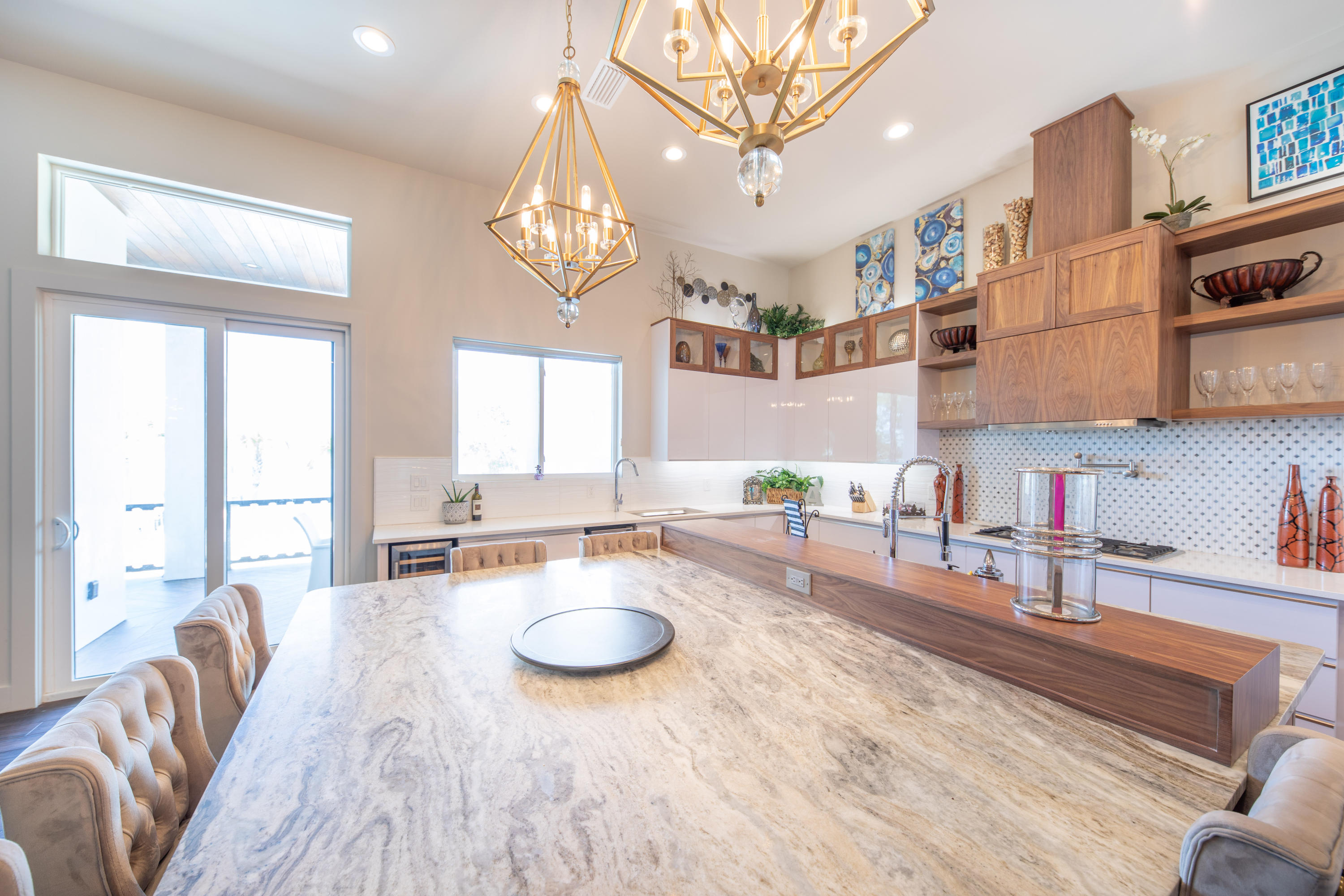 405 Driftwood Point Road Santa Rosa Beach, FL 32459 - Photo 16 of 57 a kitchen with furniture a chandelier and a view of living room