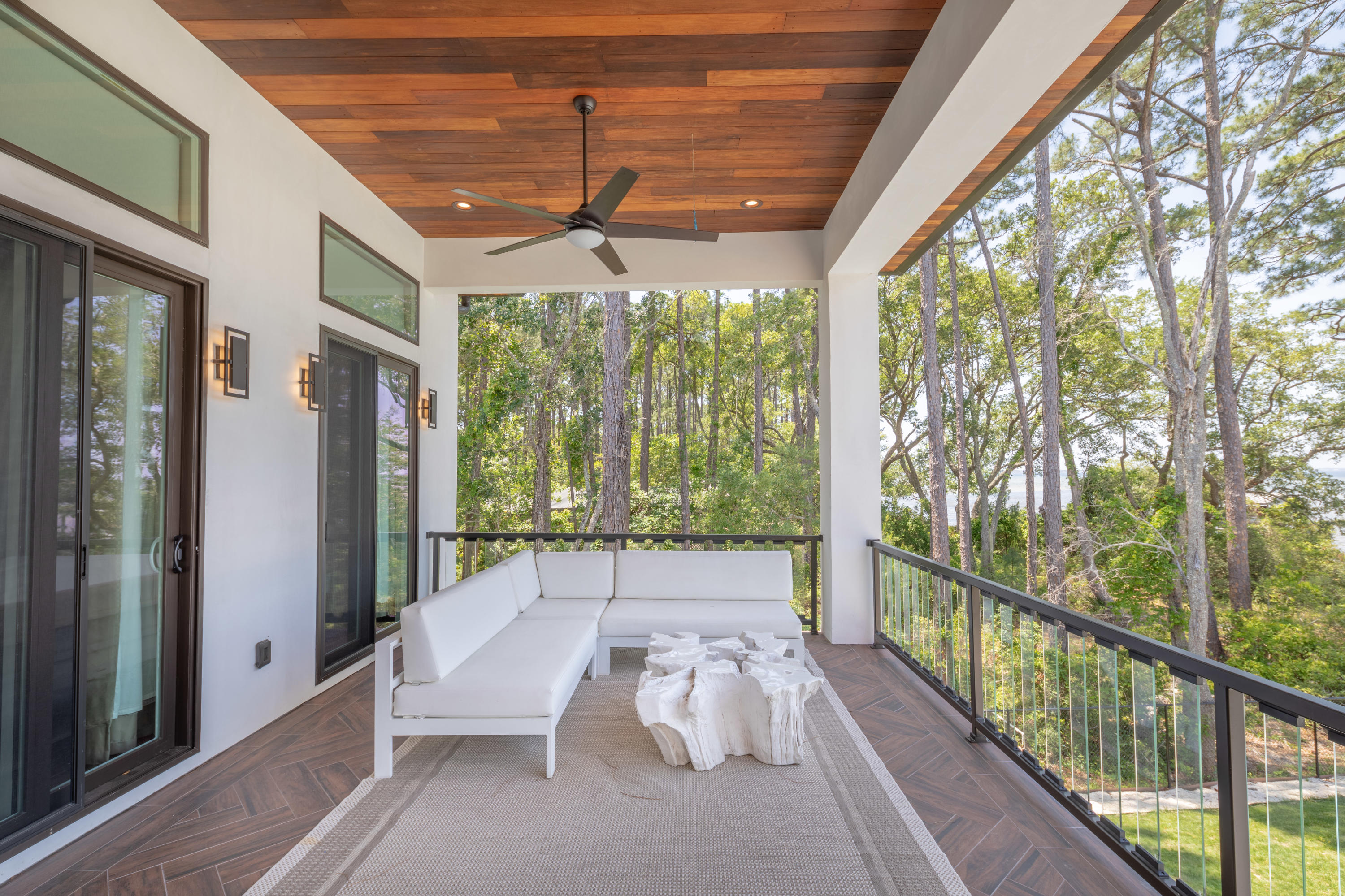 405 Driftwood Point Road Santa Rosa Beach, FL 32459 - Photo 23 of 57 a view of a patio with a table chairs and backyard