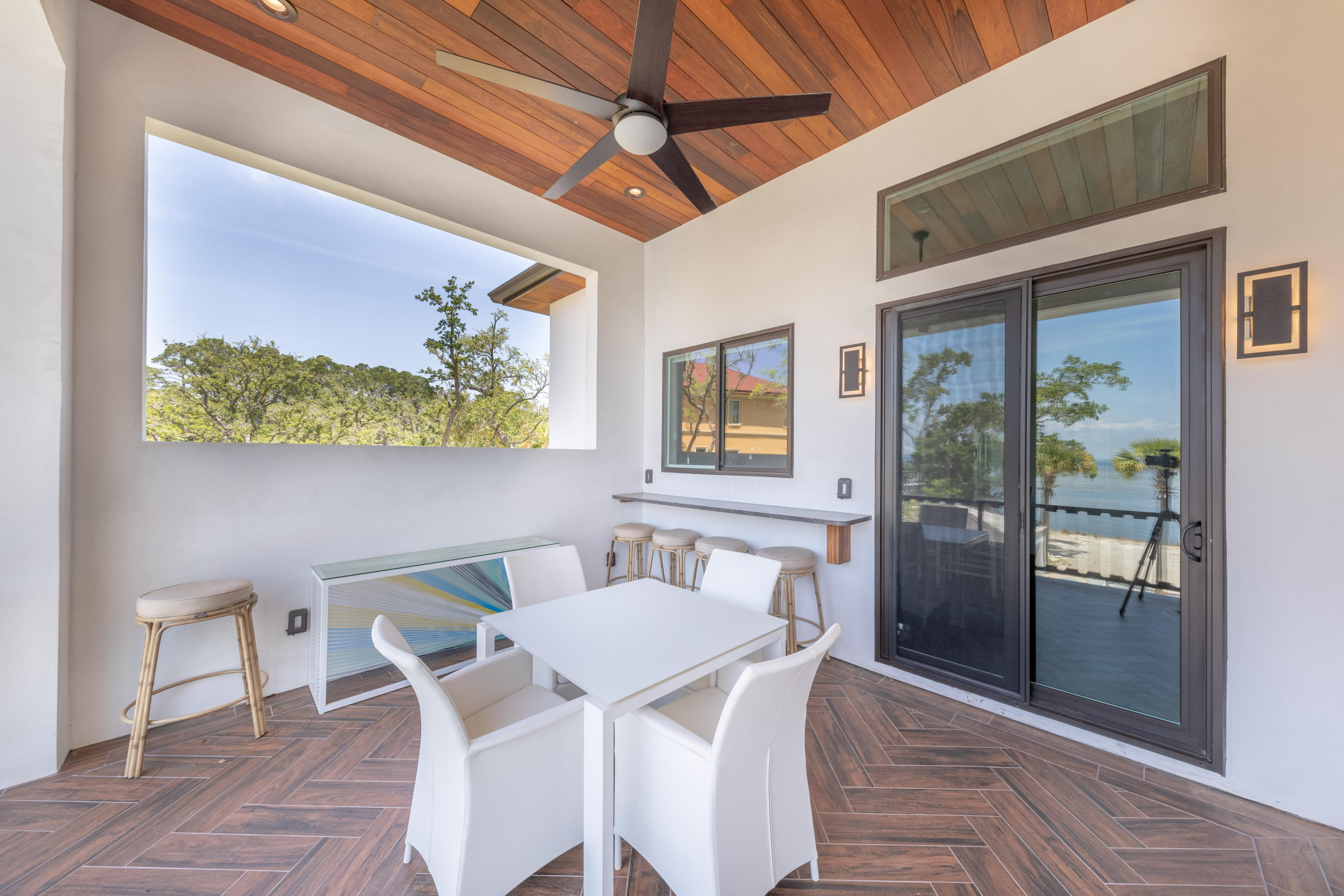 405 Driftwood Point Road Santa Rosa Beach, FL 32459 - Photo 24 of 57 a view of a dining room with furniture and a window
