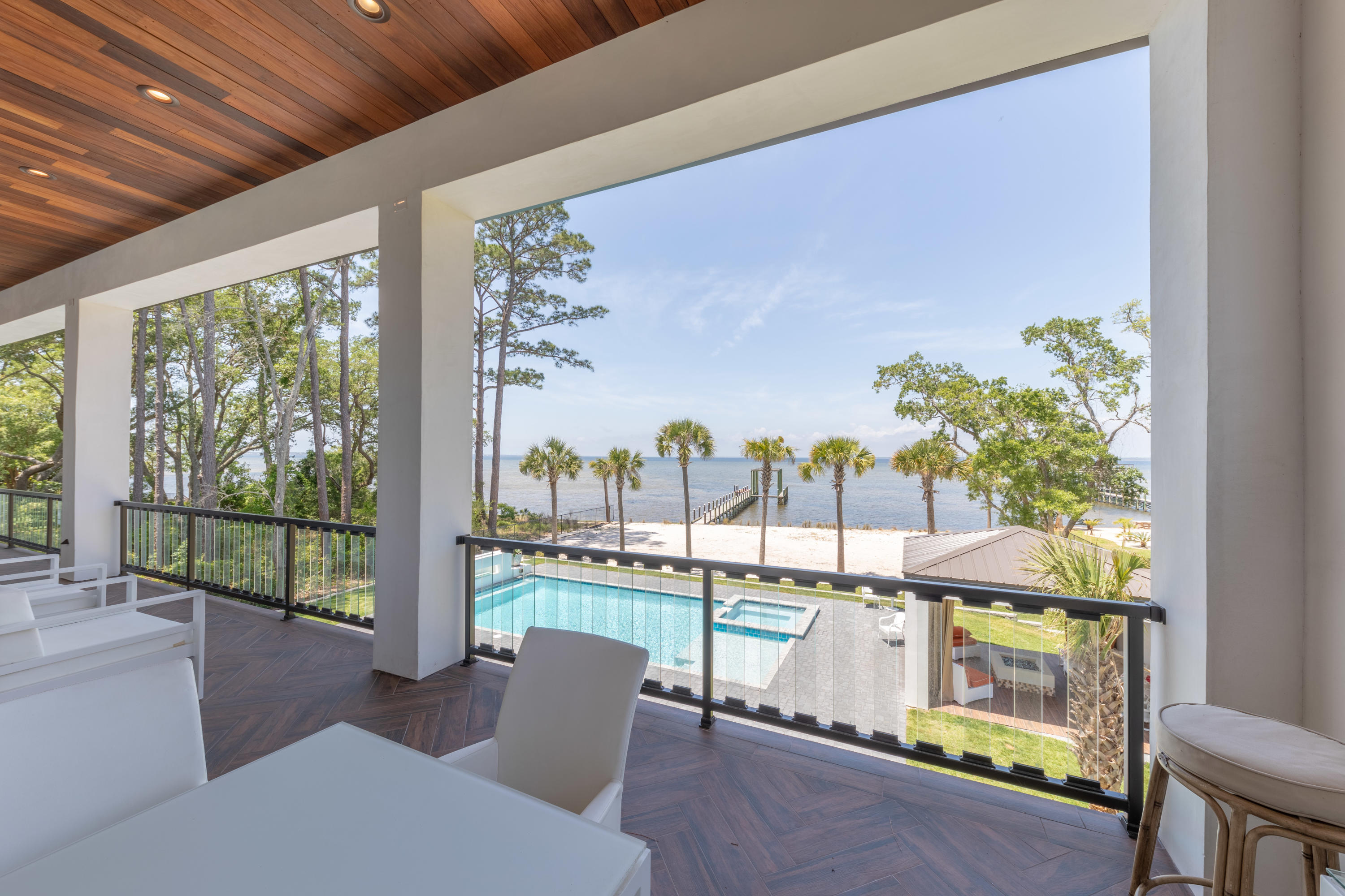 405 Driftwood Point Road Santa Rosa Beach, FL 32459 - Photo 25 of 57 a living room with furniture and a floor to ceiling window