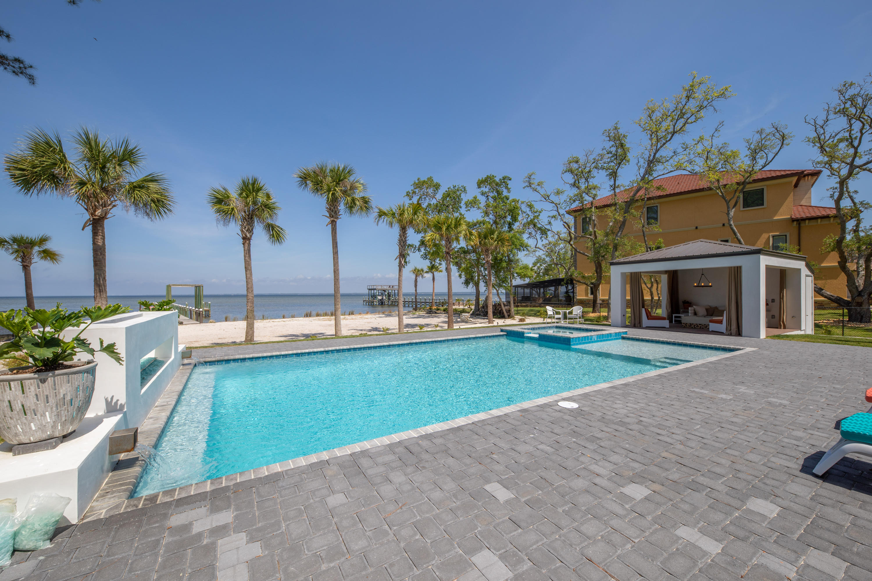 405 Driftwood Point Road Santa Rosa Beach, FL 32459 - Photo 31 of 57 a swimming pool with outdoor seating and yard