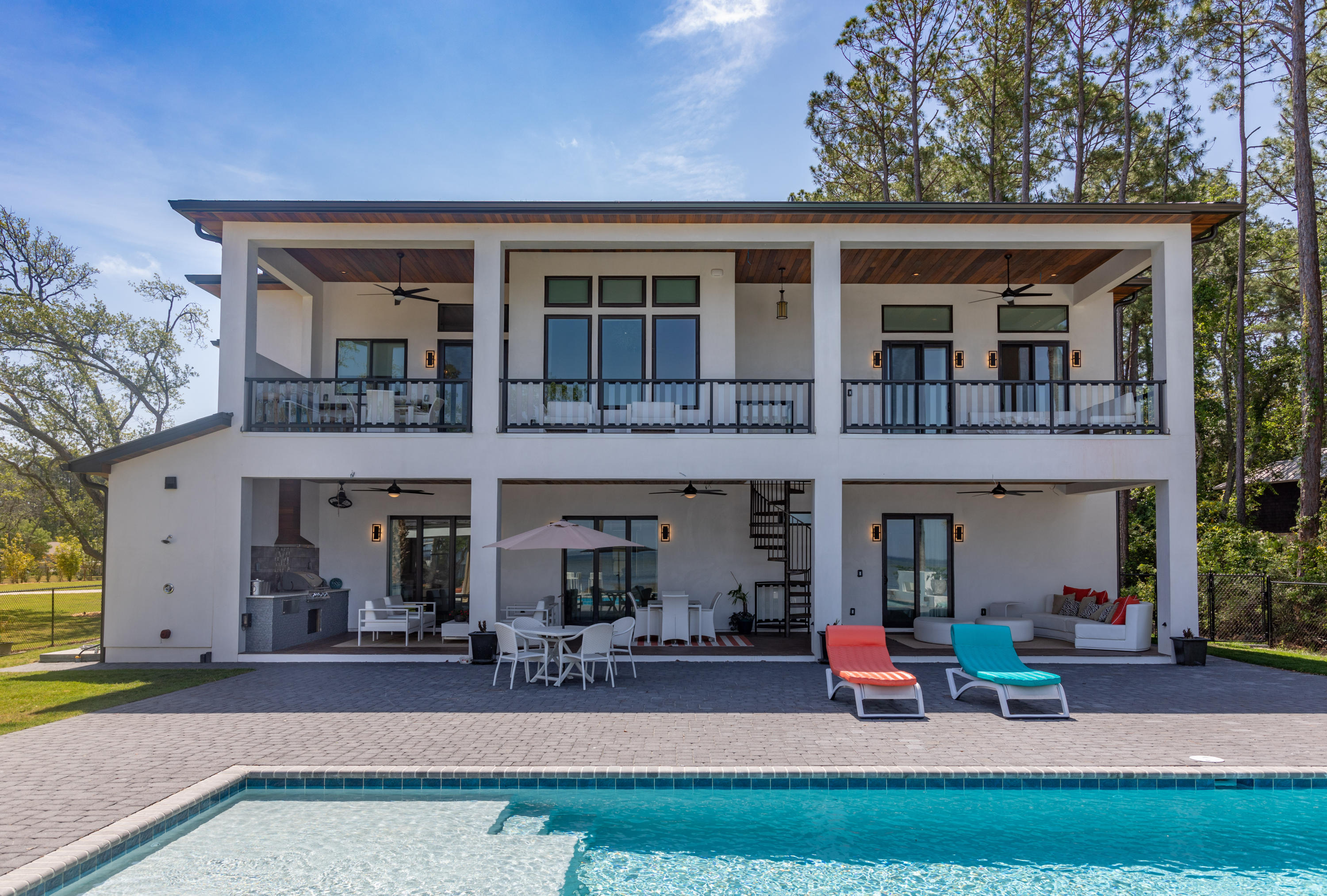 405 Driftwood Point Road Santa Rosa Beach, FL 32459 - Photo 34 of 57 a view of a house with a patio