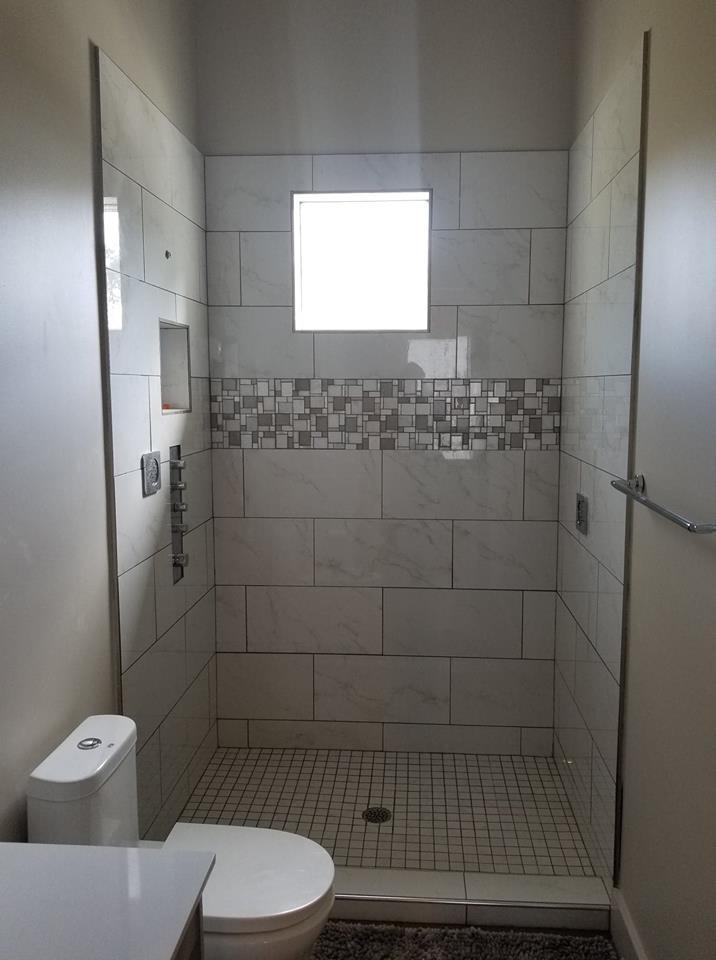 405 Driftwood Point Road Santa Rosa Beach, FL 32459 - Photo 51 of 57 a bathroom with a toilet and a shower