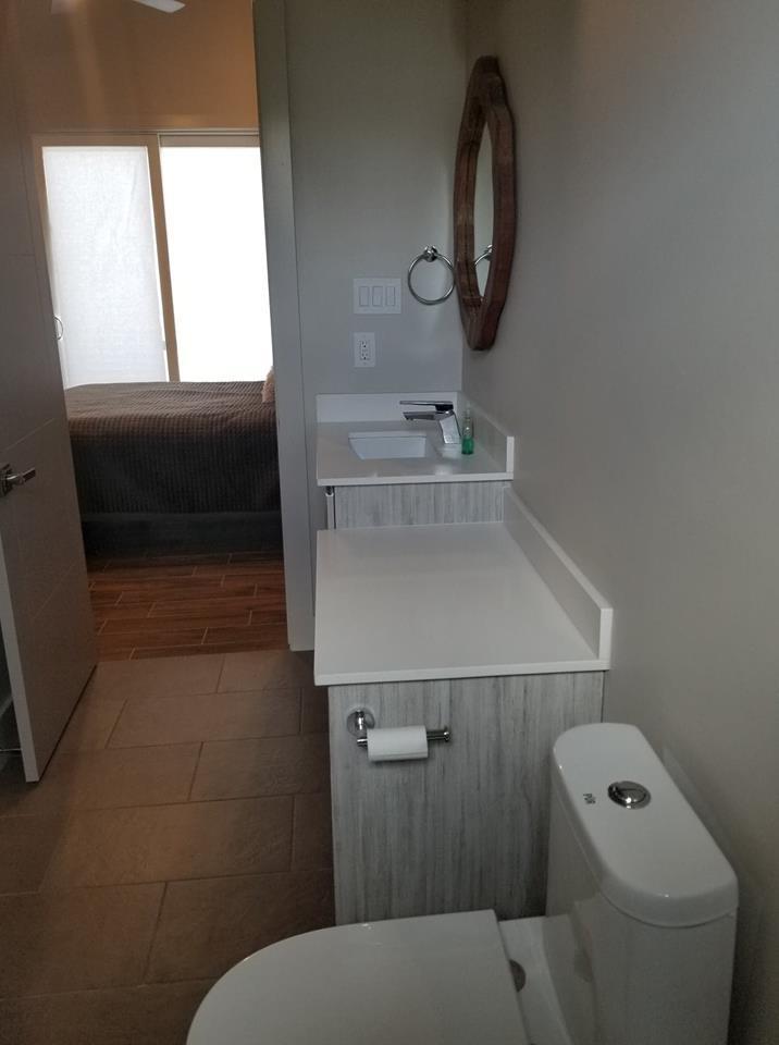 405 Driftwood Point Road Santa Rosa Beach, FL 32459 - Photo 52 of 57 a bathroom with a toilet and a sink