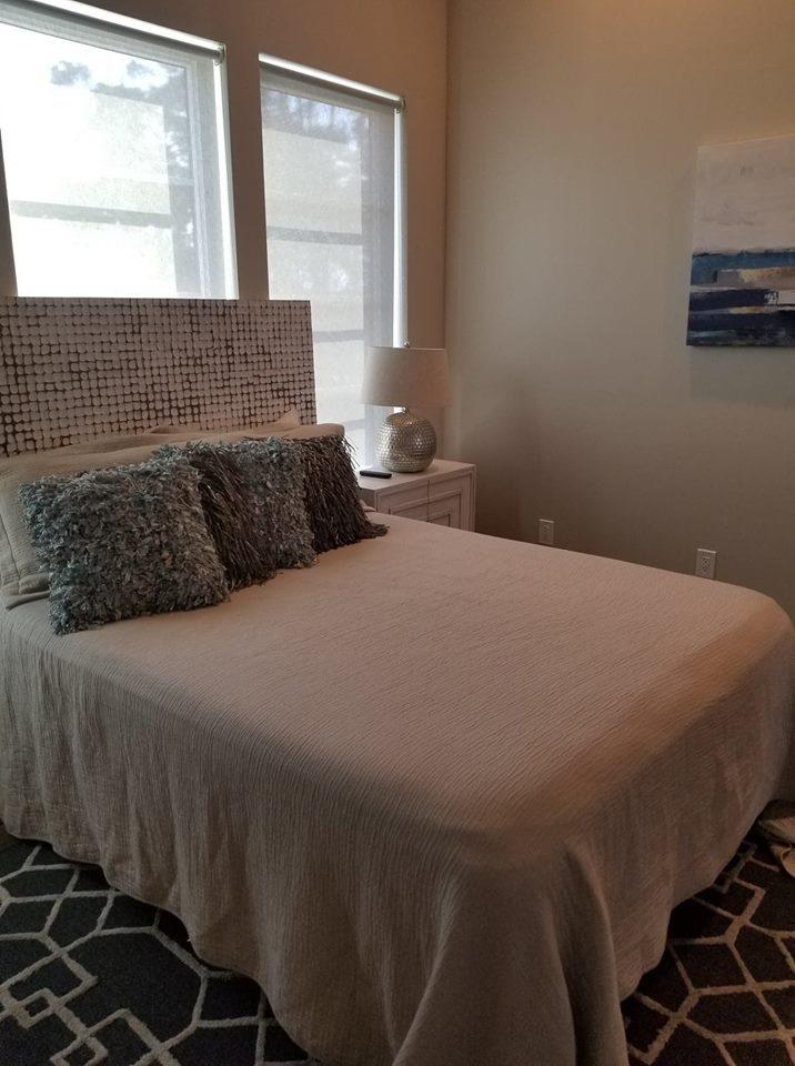 405 Driftwood Point Road Santa Rosa Beach, FL 32459 - Photo 54 of 57 a bedroom with a bed and a window