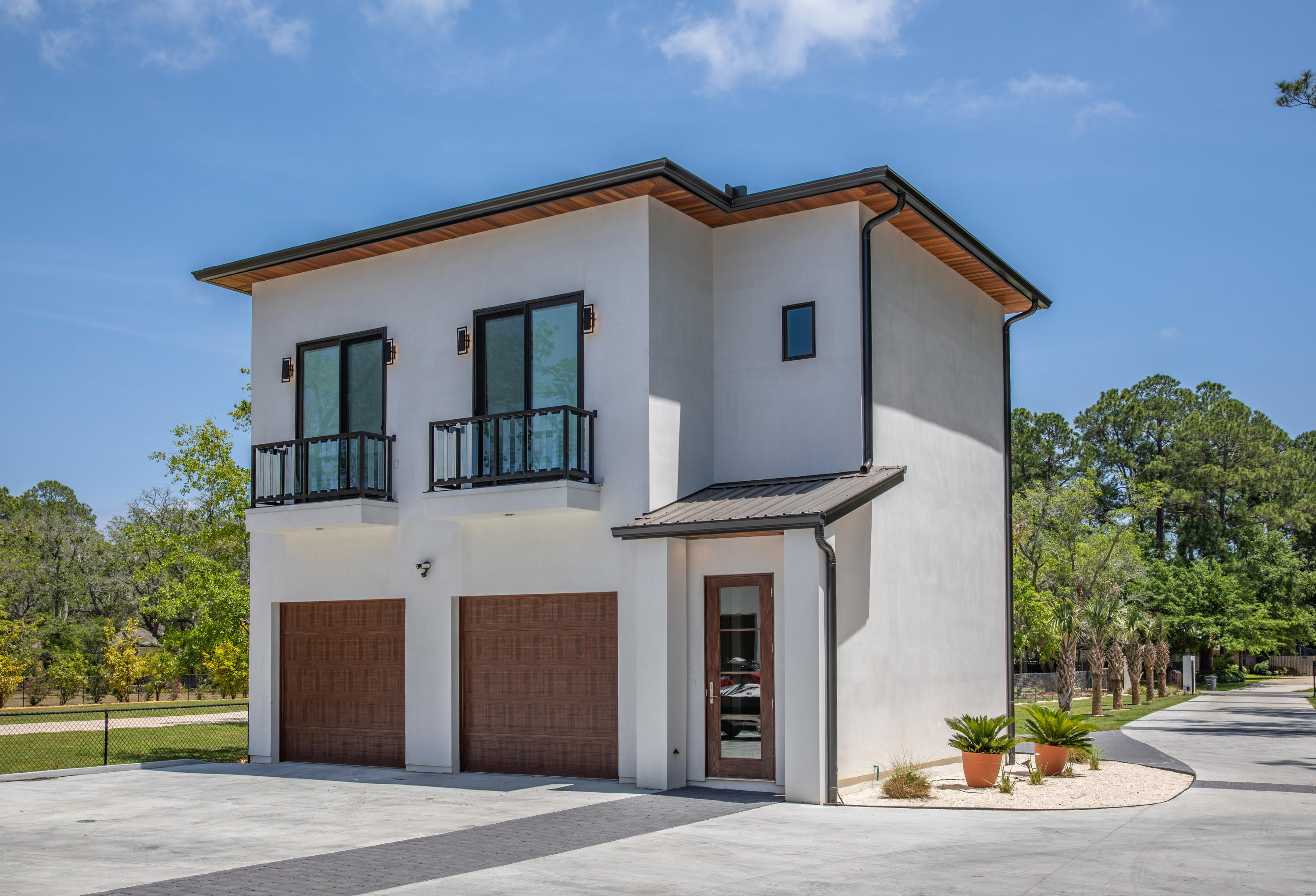 405 Driftwood Point Road Santa Rosa Beach, FL 32459 - Photo 7 of 57 a front view of a house with a yard