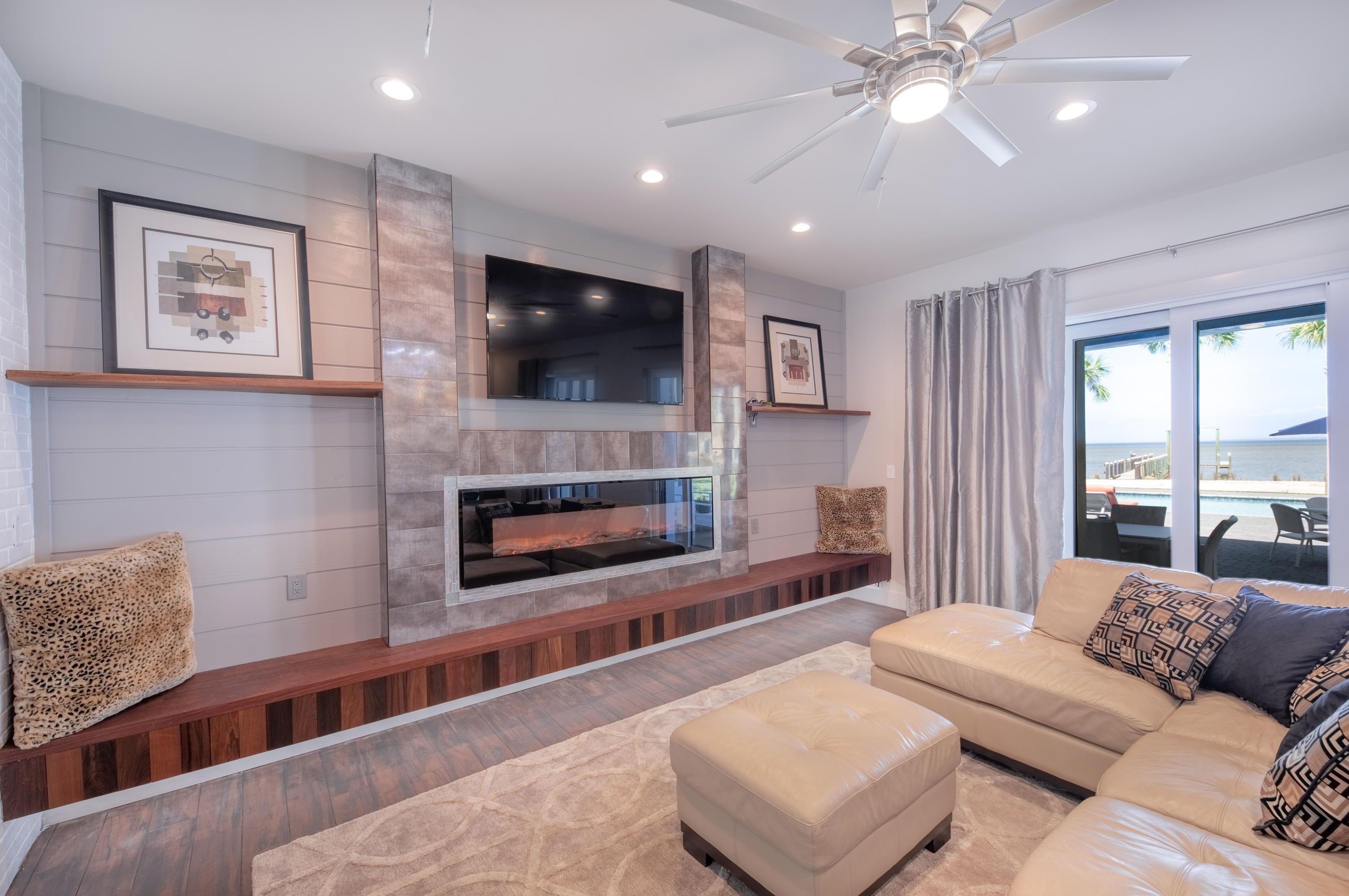 405 Driftwood Point Road Santa Rosa Beach, FL 32459 - Photo 9 of 57 a living room with furniture and a flat screen tv