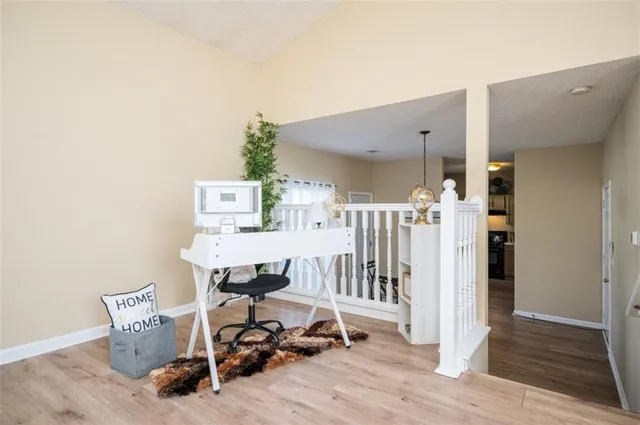 a view of a chairs and table in a room