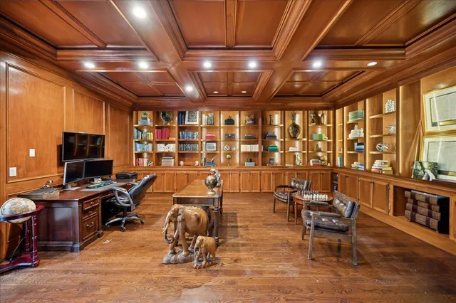 a view of a workspace with furniture