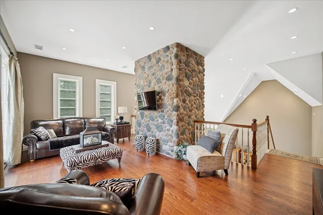 a view of a living room and a wooden floor