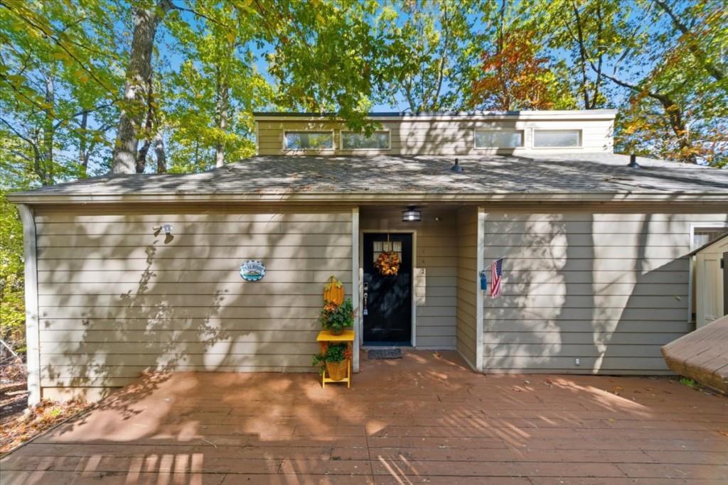 142 Indian Ridge Place Waleska, GA 30183 - Photo 1 of 1 a view of outdoor space with brick wall and windows