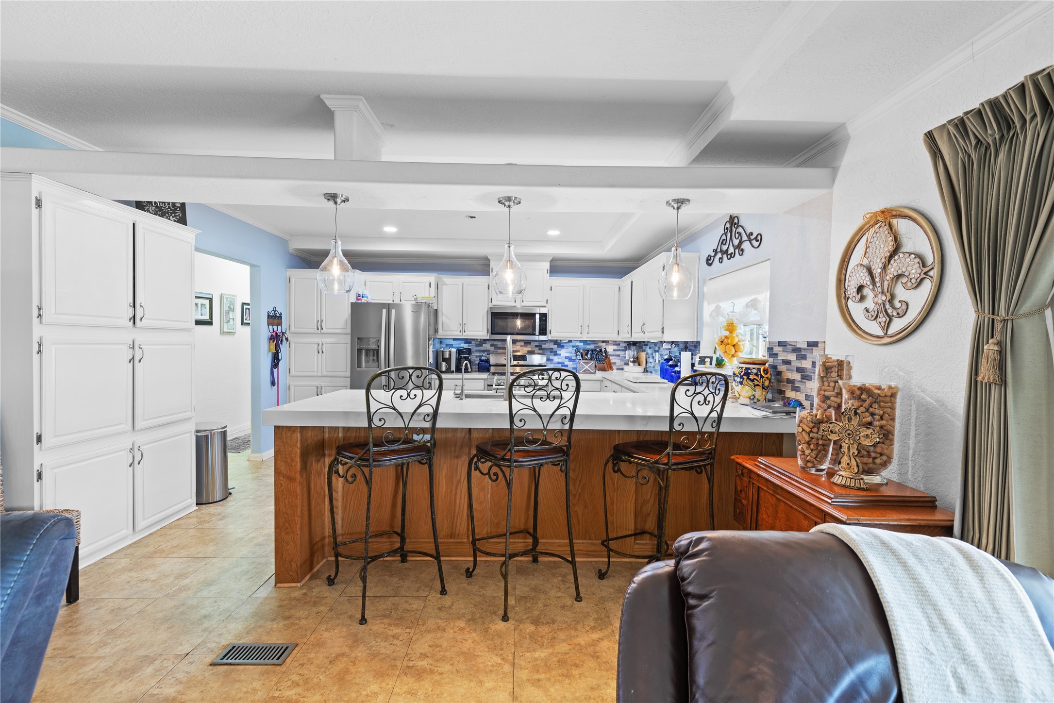 174 Lake Front Drive Trinity, TX 75862 - Photo 6 of 44 a view of a kitchen with furniture and a clock
