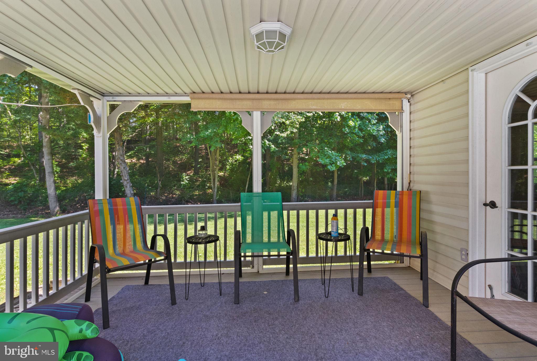 32 Hamilton Lane Elkton, MD 21921 - Photo 9 of 40 Charming porch with vibrant seating.