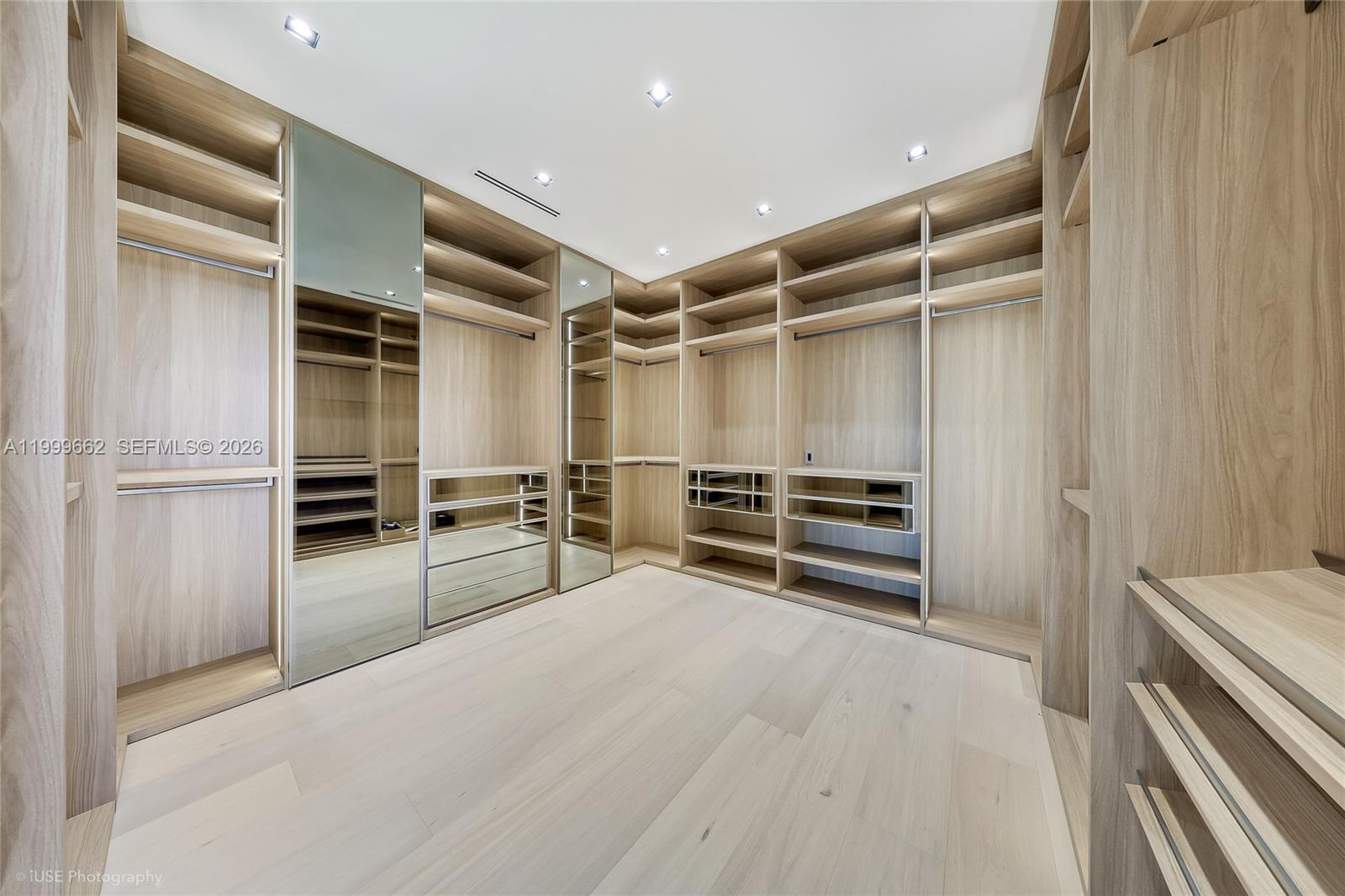 770 Lake Road Miami, FL 33137 - Photo 11 of 39 a view of walk in closet with empty racks