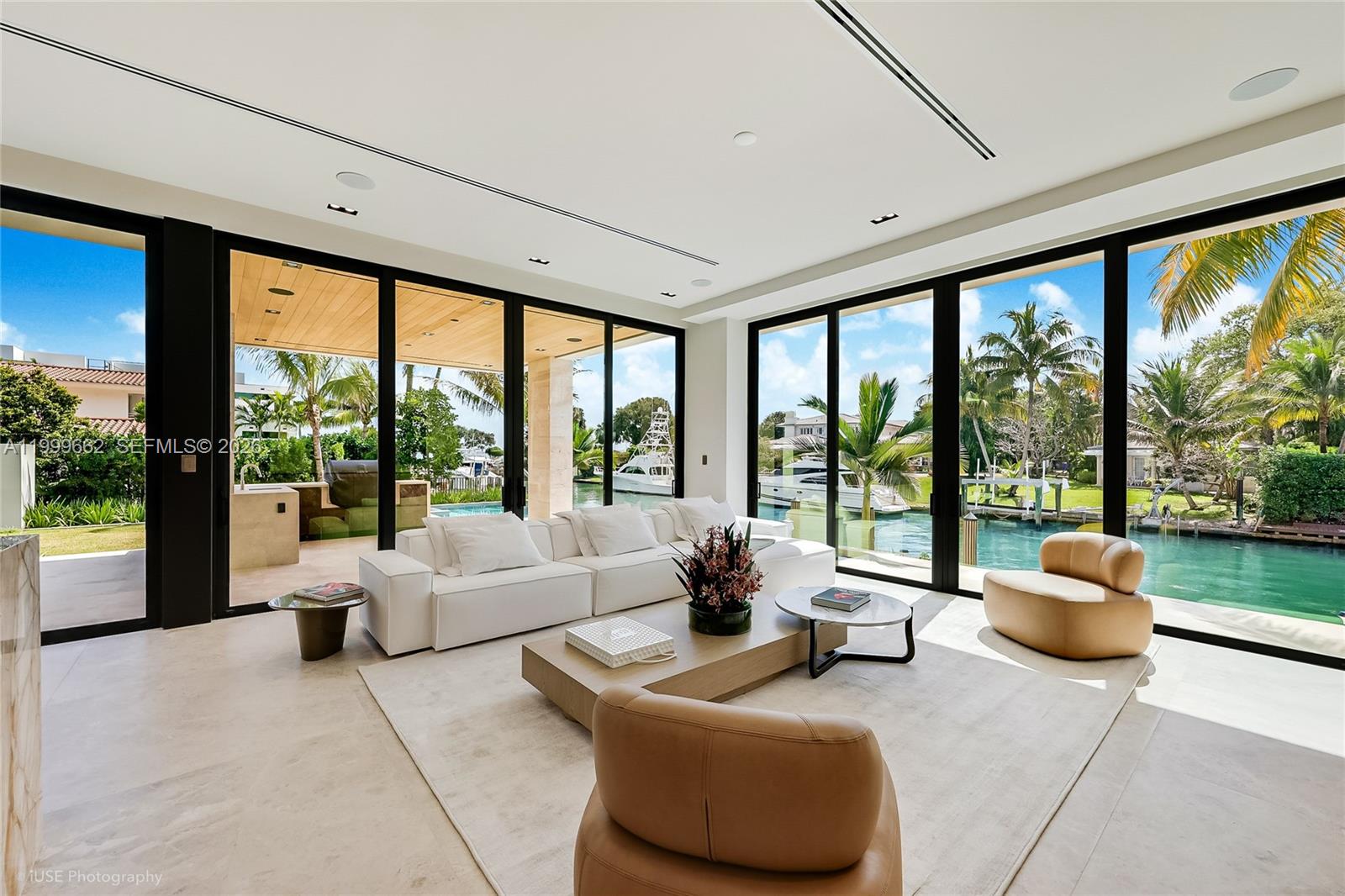 770 Lake Road Miami, FL 33137 - Photo 16 of 39 a living room with furniture and large windows