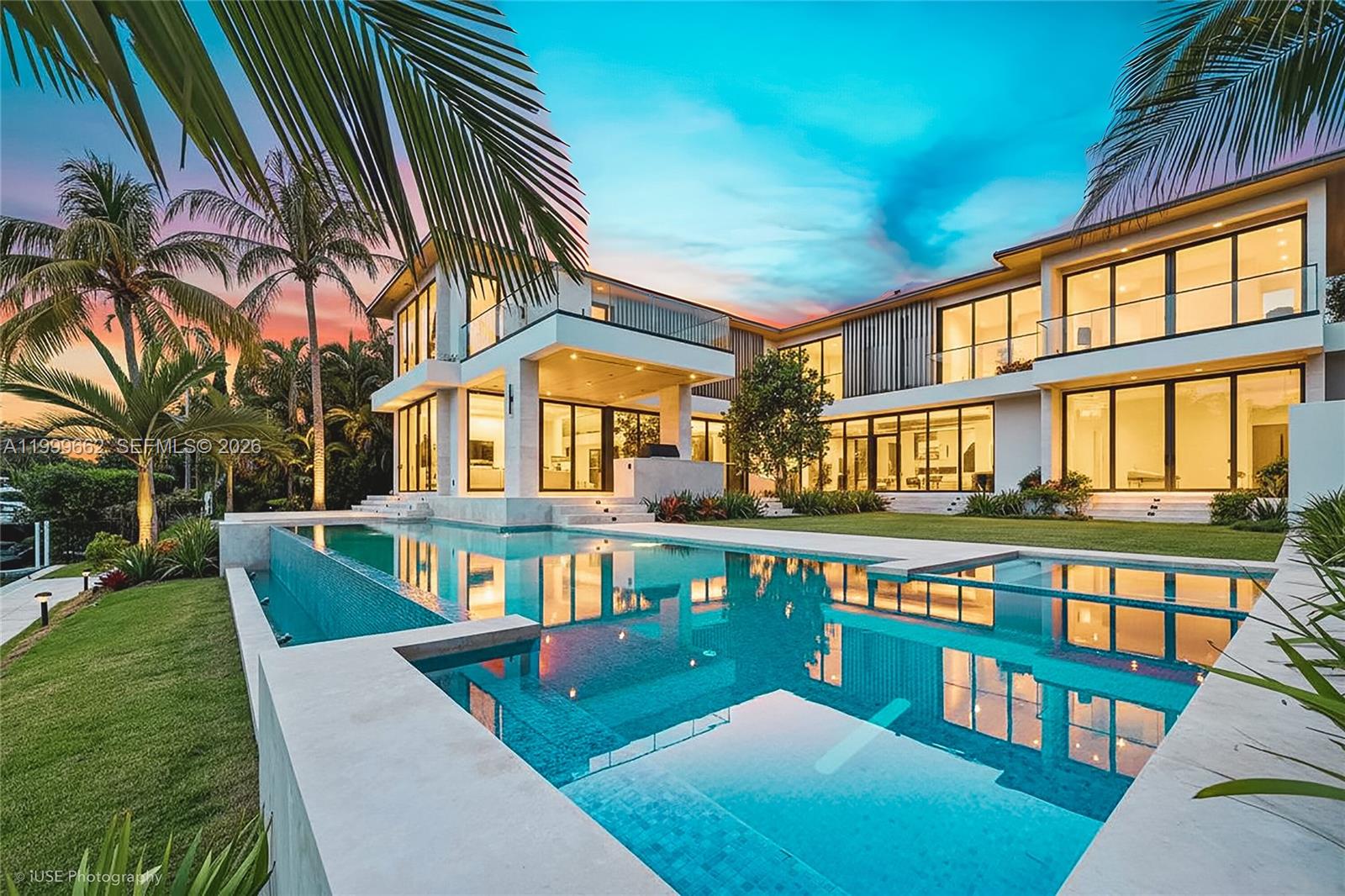 770 Lake Road Miami, FL 33137 - Photo 2 of 39 front view of a house with a swimming pool