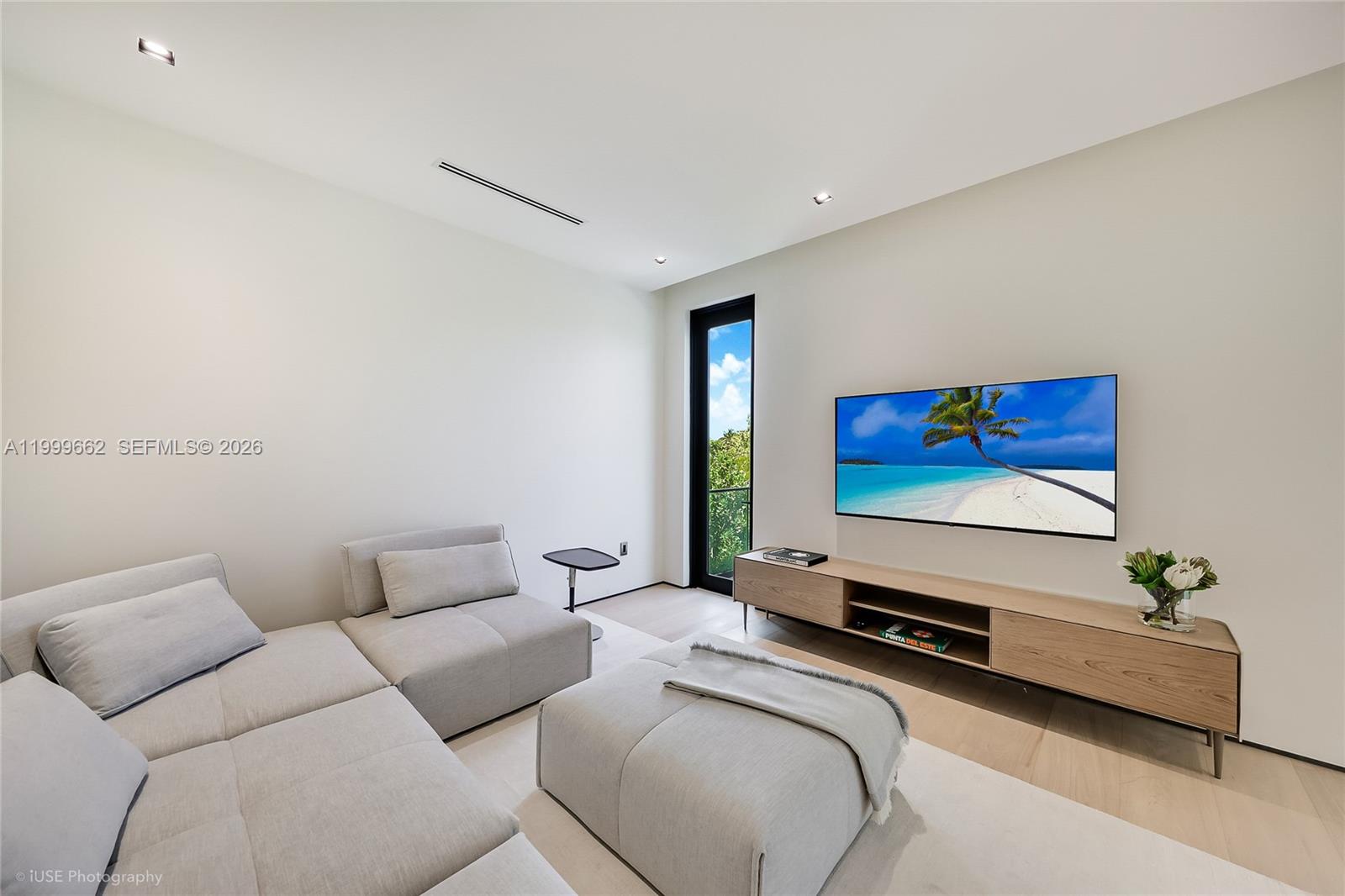 770 Lake Road Miami, FL 33137 - Photo 24 of 39 a living room with furniture and a flat screen tv