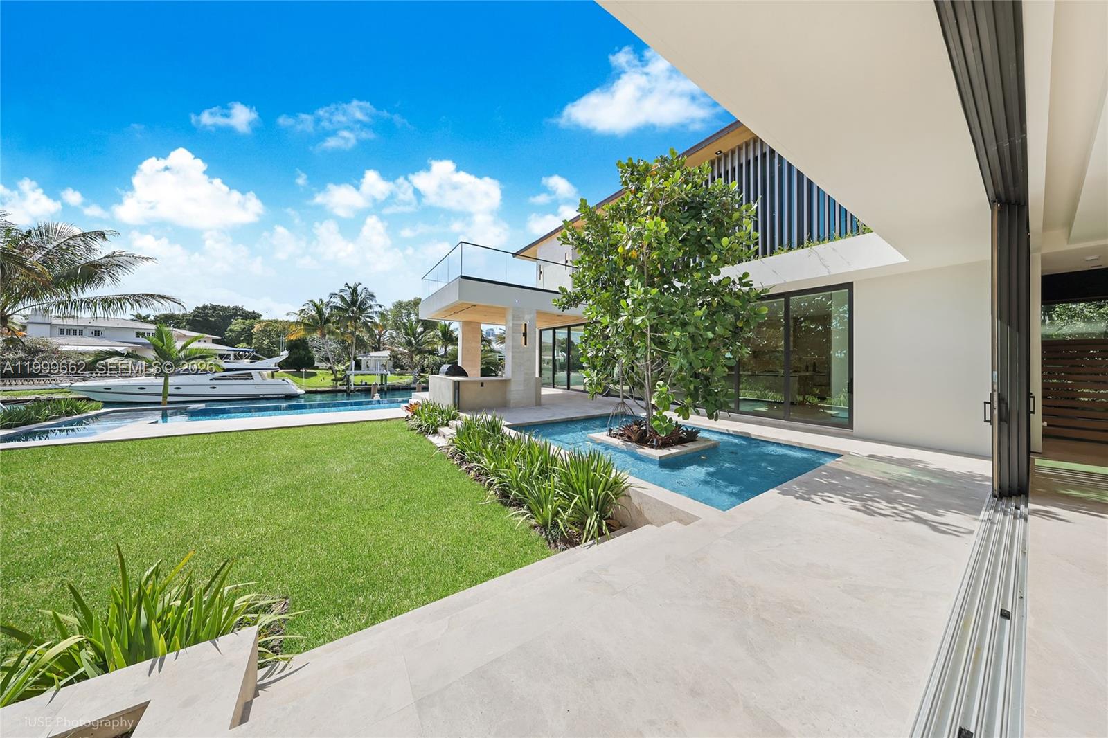 770 Lake Road Miami, FL 33137 - Photo 28 of 39 a front view of a house with garden