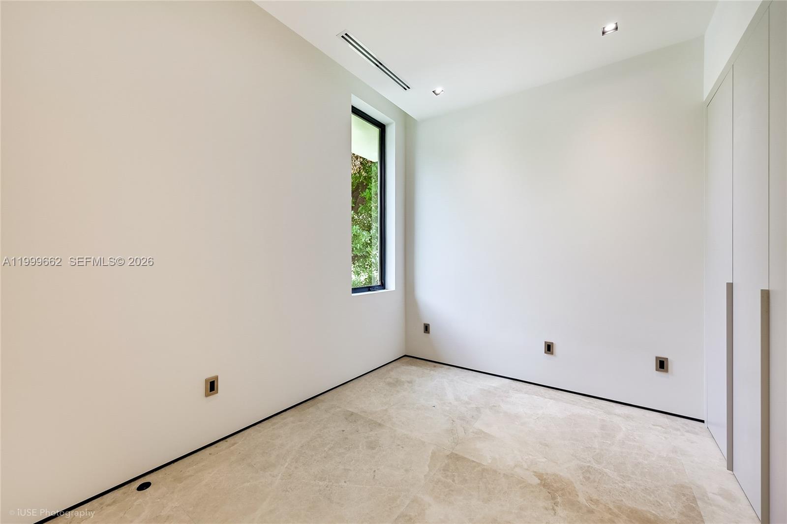 770 Lake Road Miami, FL 33137 - Photo 32 of 39 an empty room with windows