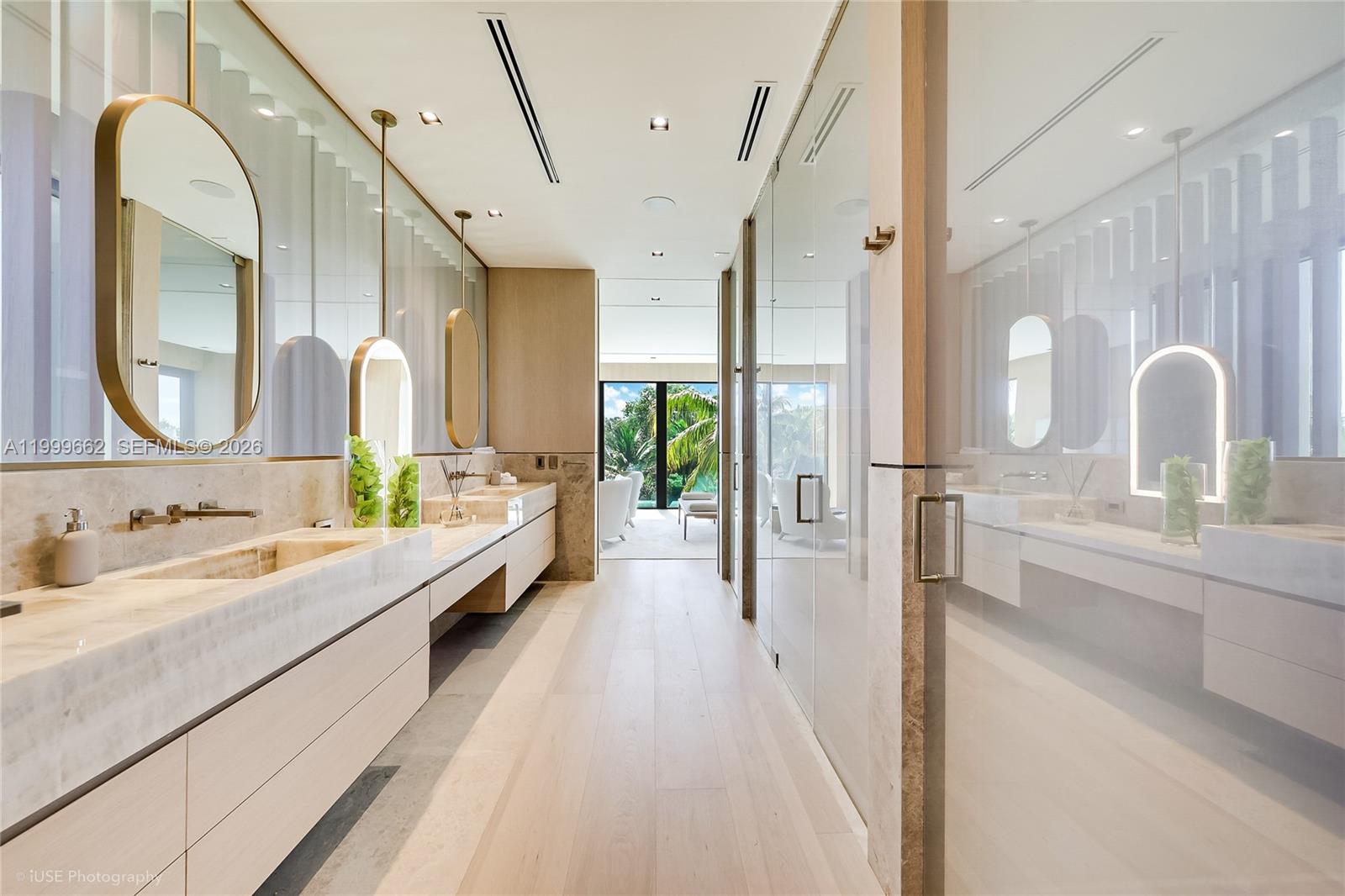 770 Lake Road Miami, FL 33137 - Photo 9 of 39 a bathroom with a double vanity sink mirror and bathtub