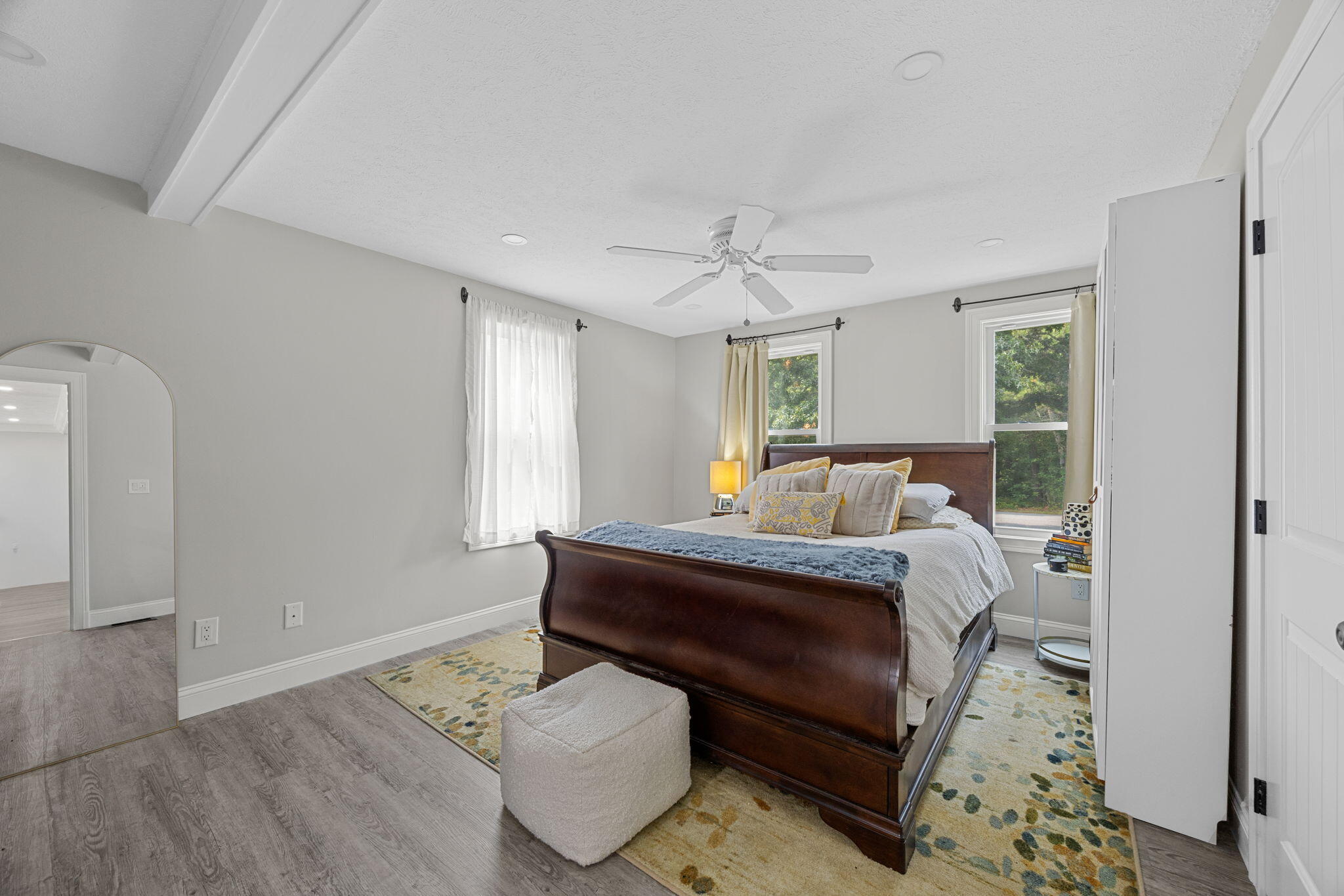 140 Noisy Hole Road Mashpee, MA 02649 - Photo 16 of 53 a bed room with a bed and a couch