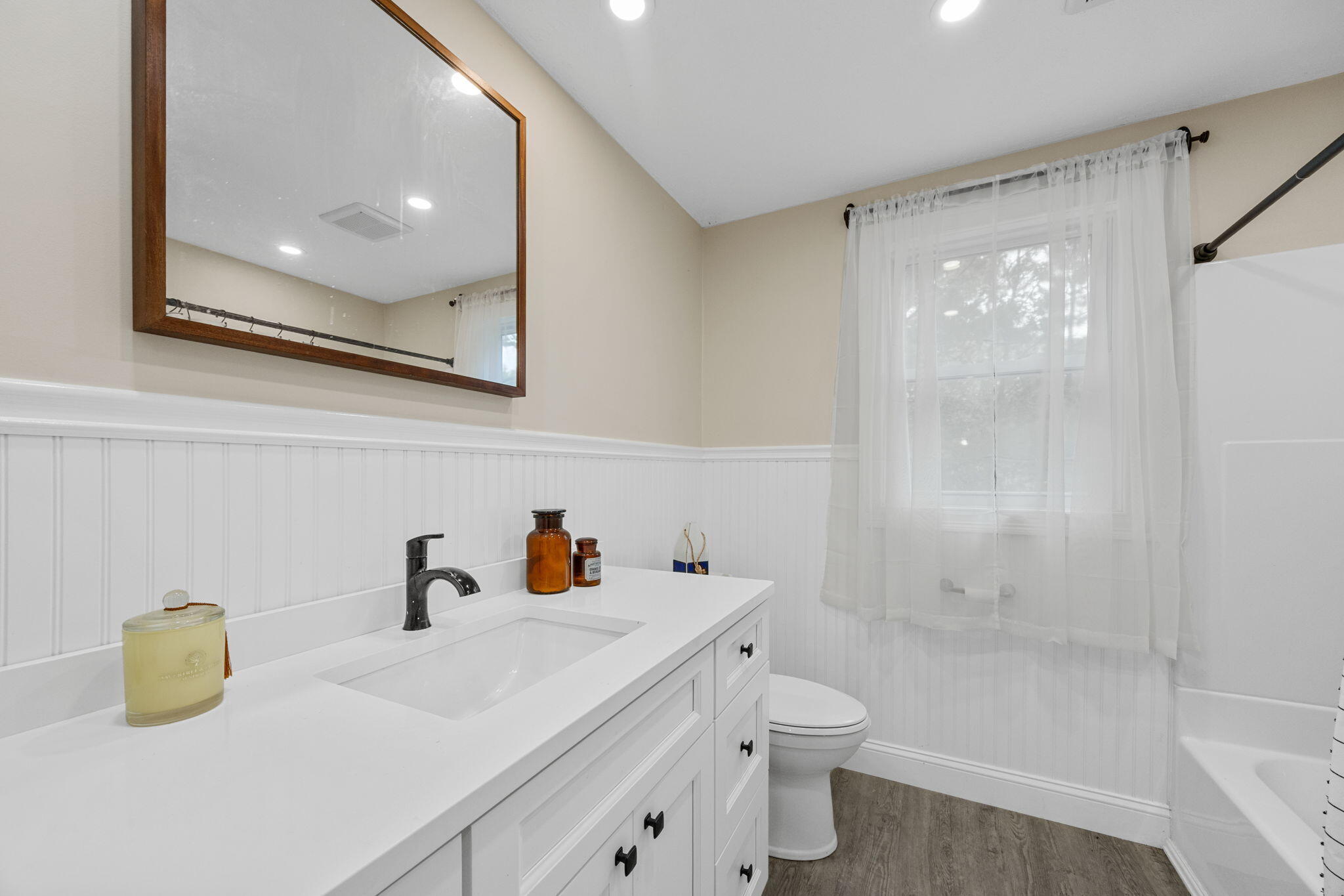 140 Noisy Hole Road Mashpee, MA 02649 - Photo 20 of 53 a bathroom with a sink a toilet and shower