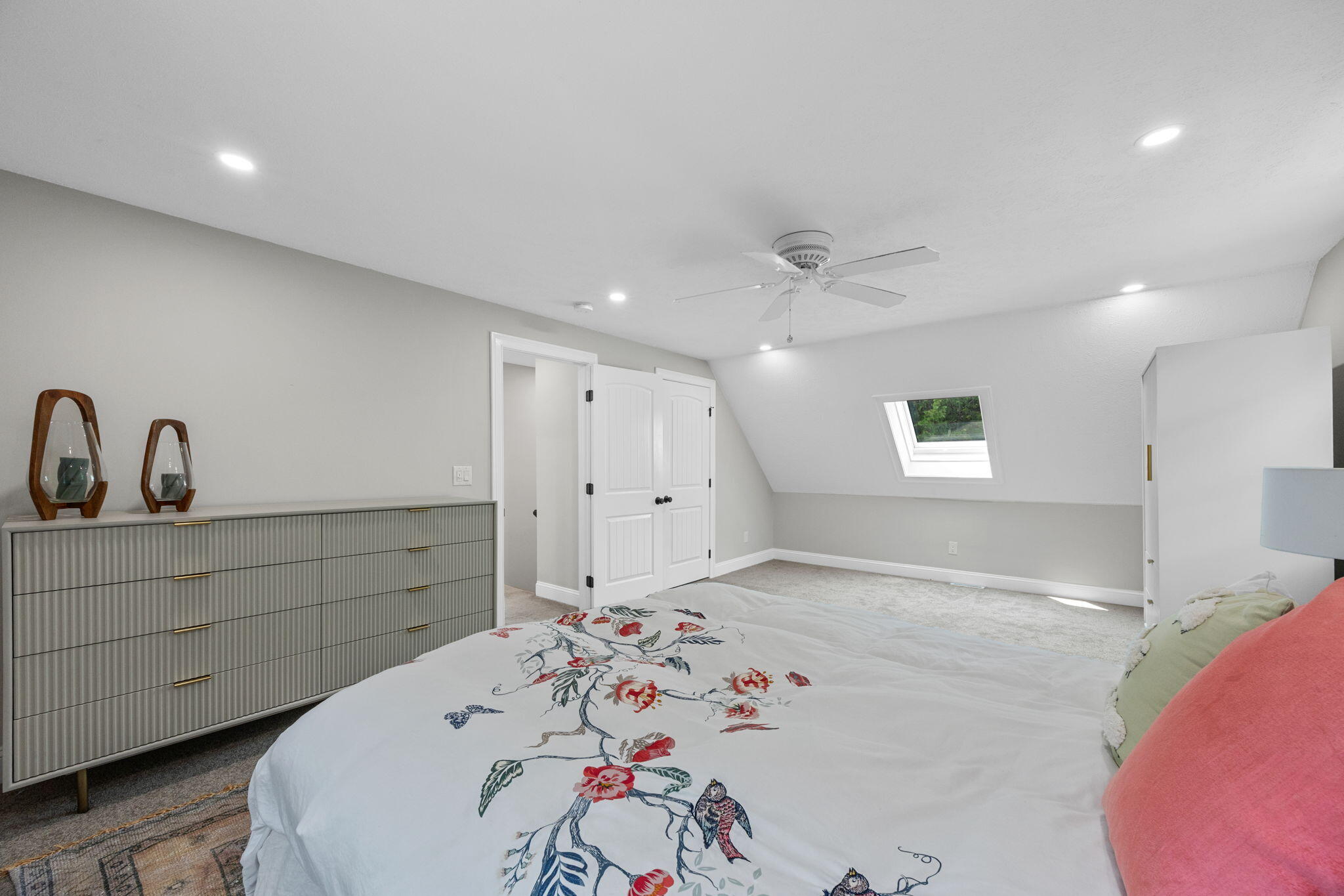 140 Noisy Hole Road Mashpee, MA 02649 - Photo 26 of 53 a spacious bedroom with a bed and a dresser