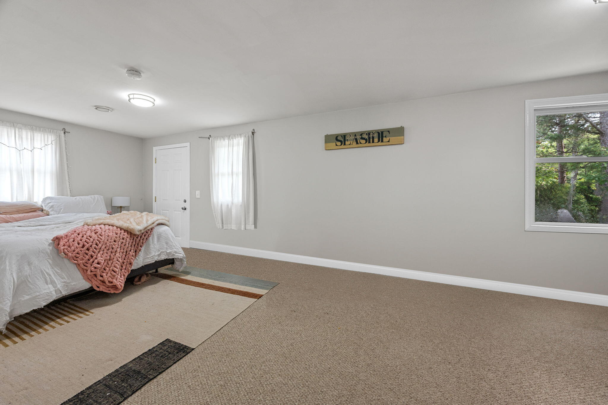 140 Noisy Hole Road Mashpee, MA 02649 - Photo 34 of 53 a bedroom with a bed and a window