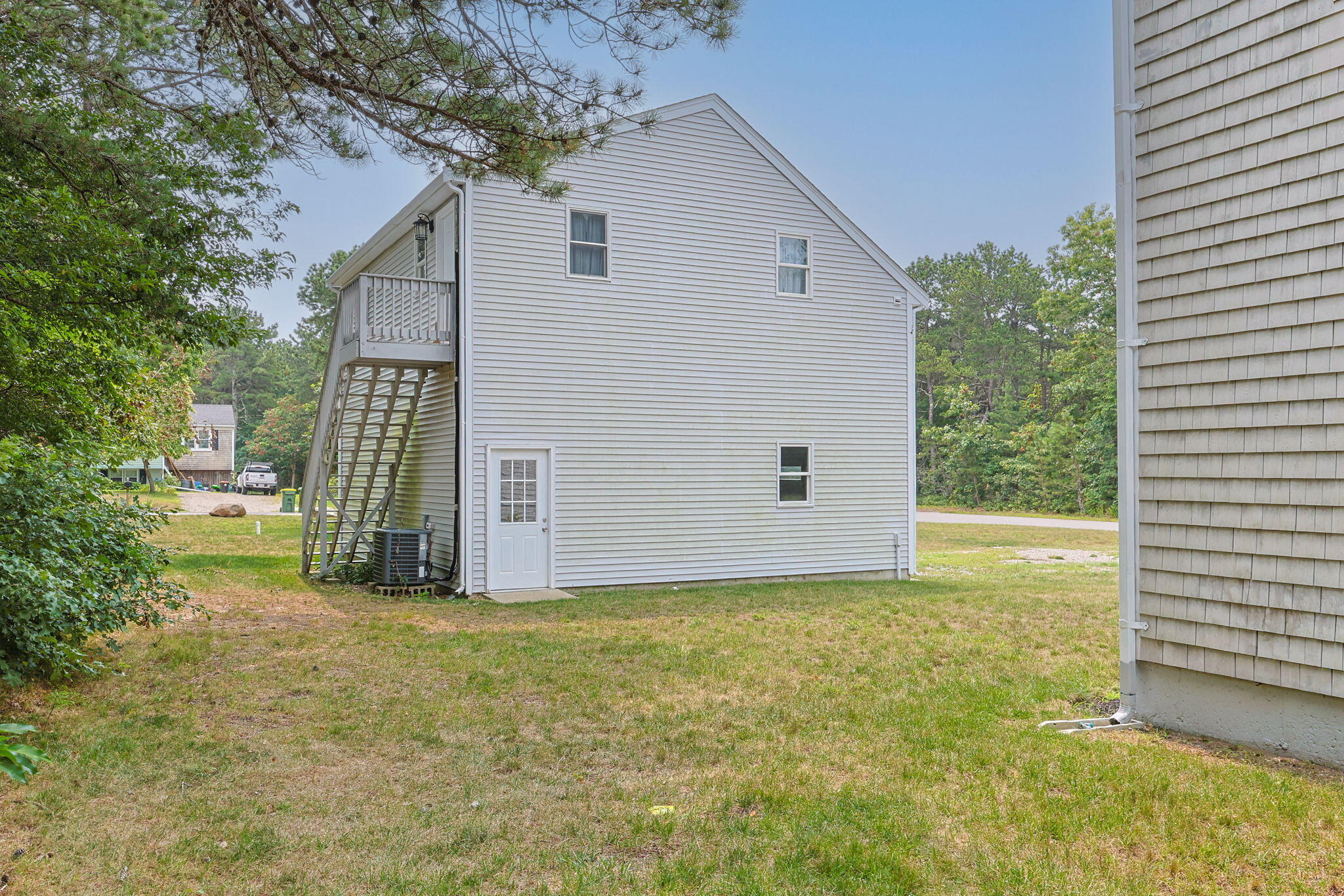 140 Noisy Hole Road Mashpee, MA 02649 - Photo 44 of 53 a view of a backyard of the house