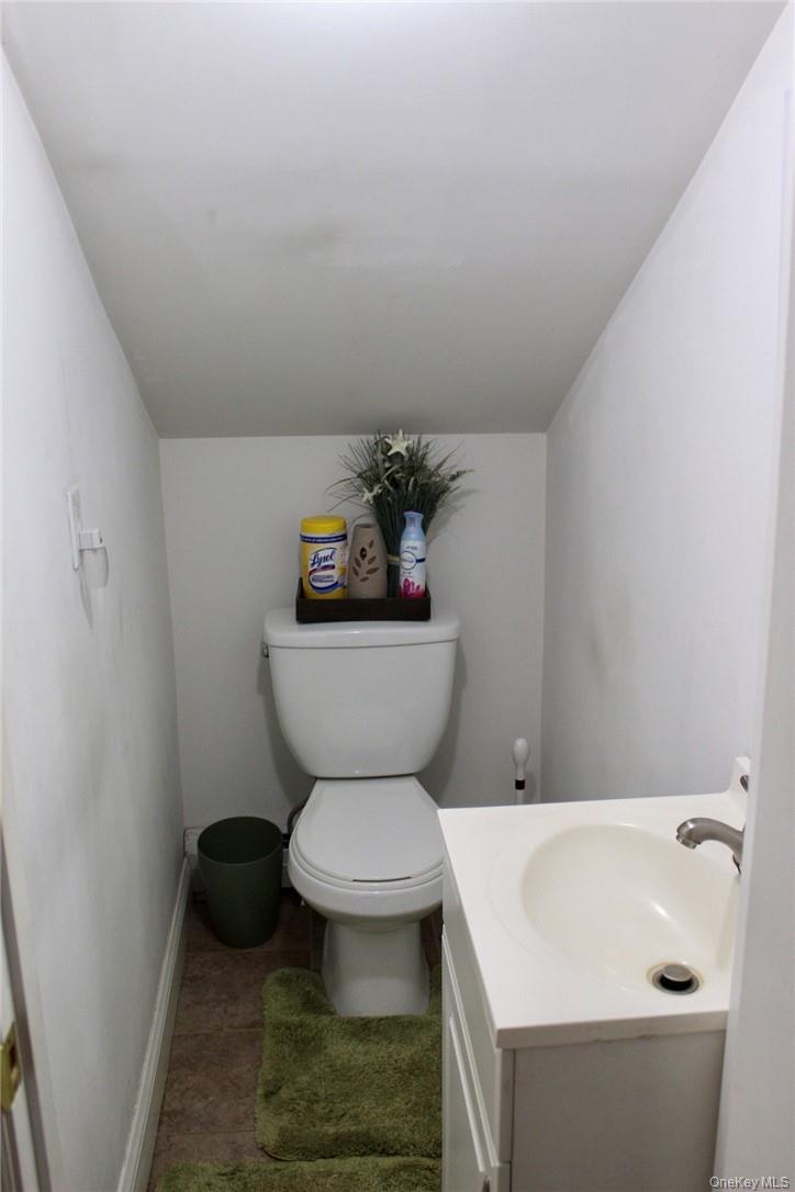 5834 Albany Post Road Cortlandt Manor, NY 10567 - Photo 12 of 14 Bathroom with vanity and toilet