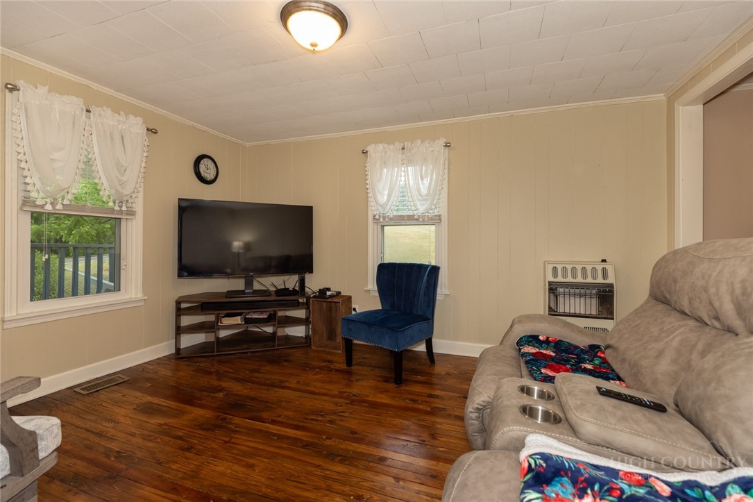 1335 Shingle Gap Road Purlear, NC 28665 - Photo 40 of 49 a living room with furniture and a flat screen tv