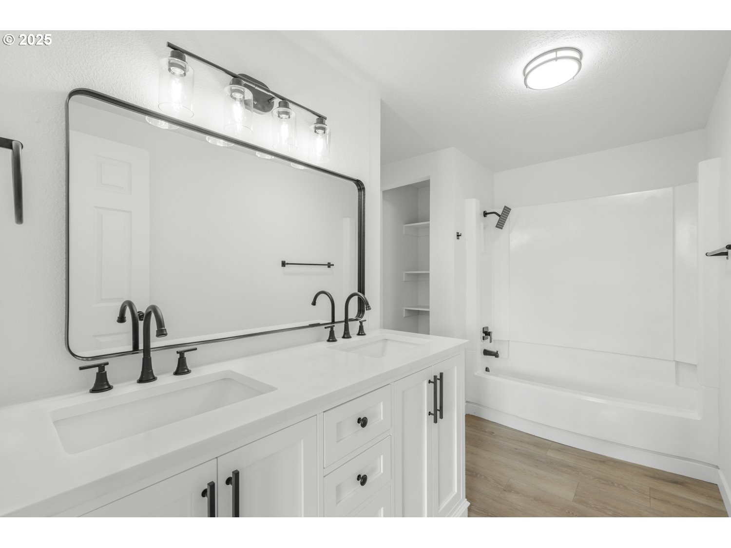 871 Liberty Bell Drive, Unit 474 Beaverton, OR 97006 - Photo 15 of 26 a bathroom with a double vanity sink mirror and double