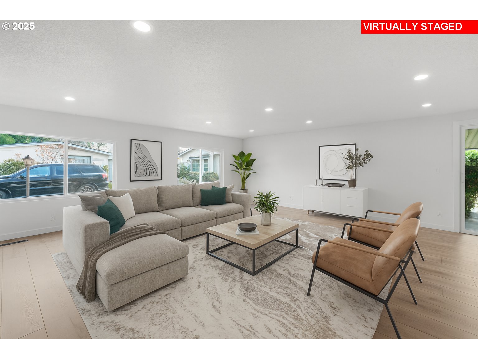 871 Liberty Bell Drive, Unit 474 Beaverton, OR 97006 - Photo 3 of 26 a living room with furniture and a table
