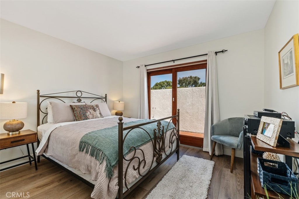 23862 Marmara Bay Dana Point, CA 92629 - Photo 14 of 21 a bedroom with a bed and a window