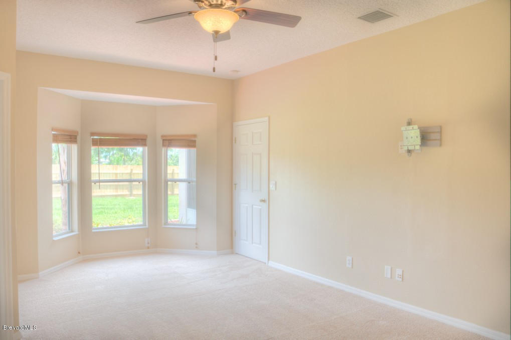 2110 Gandy Road Southwest Palm Bay, FL 32908 - Photo 14 of 18 Master w/ Bay Windows
